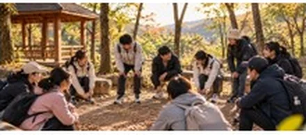 나무 아래 야외 테이블에 둥글게 모여 앉은 사람들